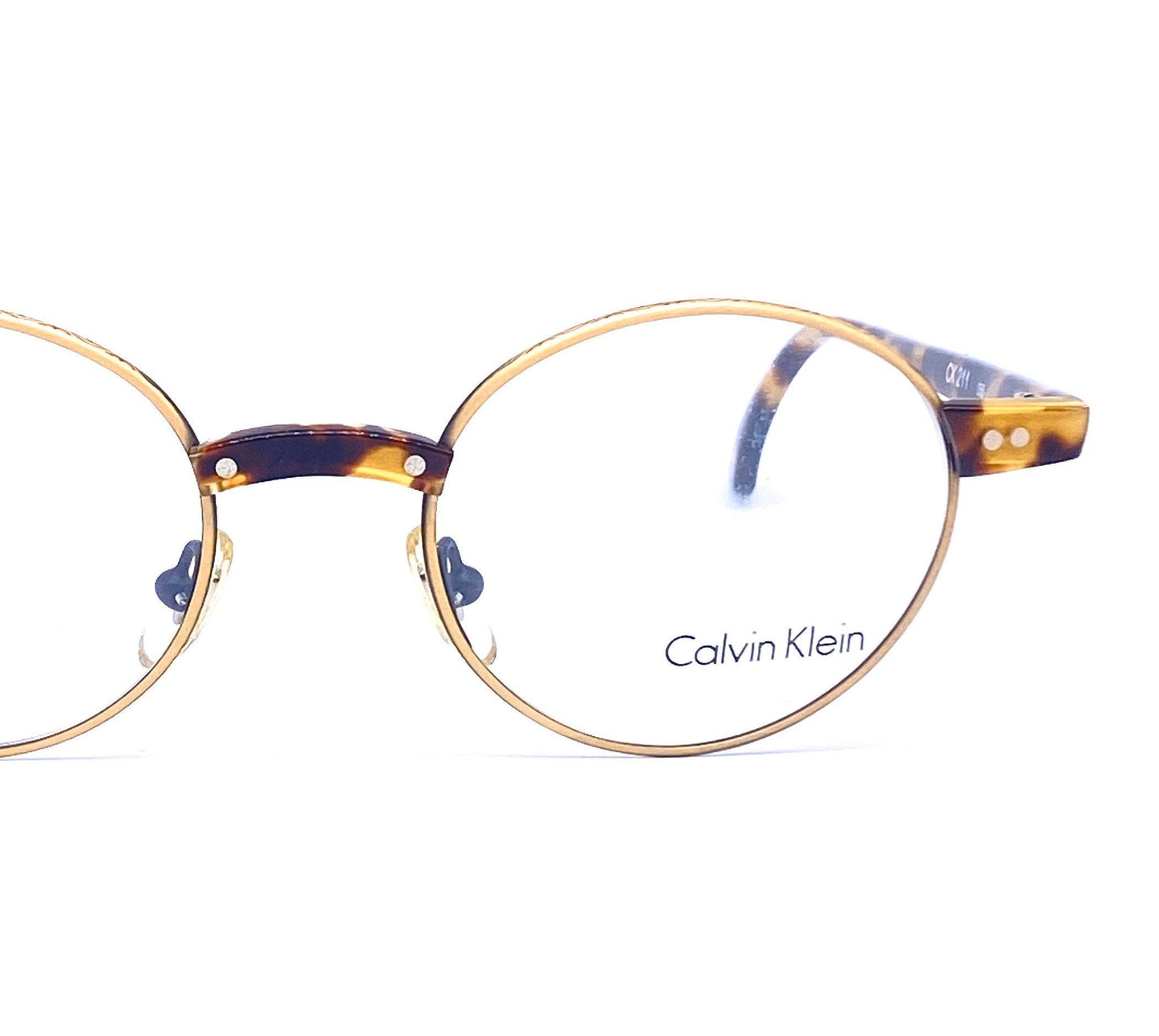 Calvin Klein CK211 round gold metal rim sunglasses with matte tortoise temples, NOS 90s