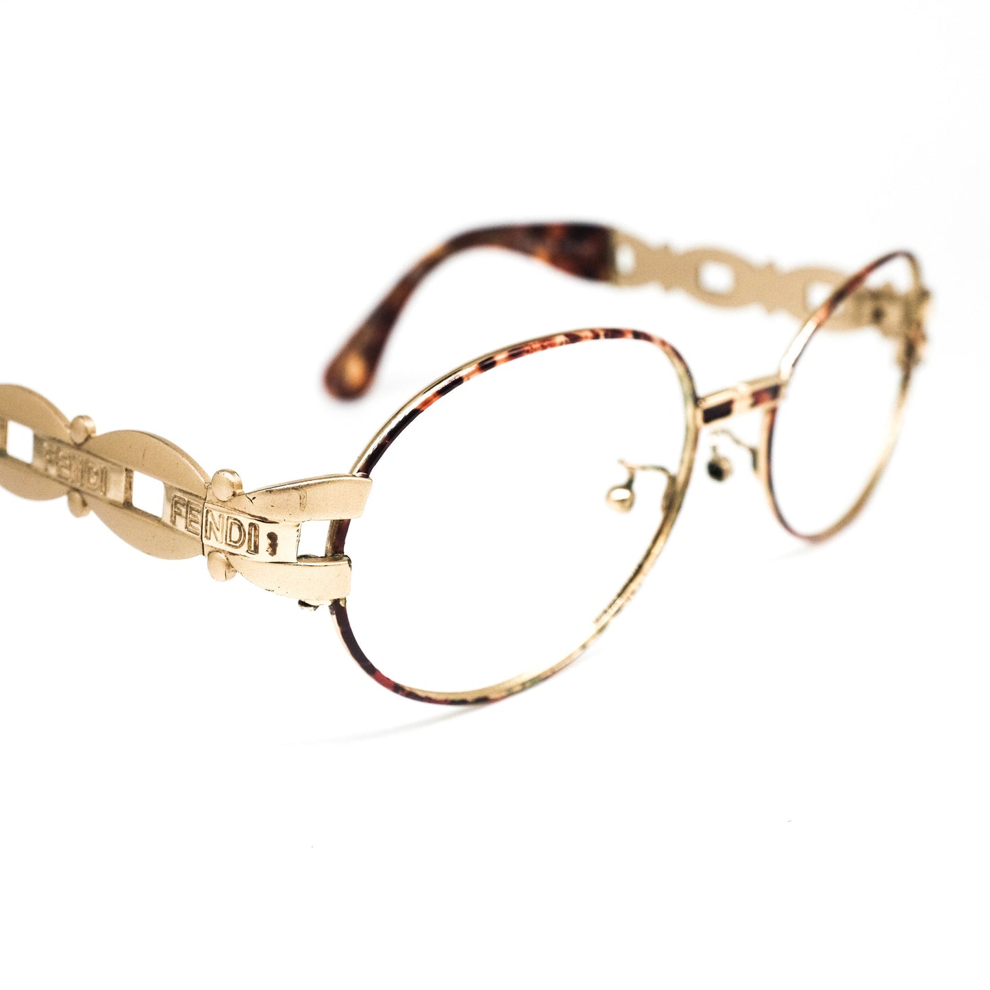 Fendi SL 7058 oval satin gold eyeglasses frames with cutoff logo details on temples, 90s great condition