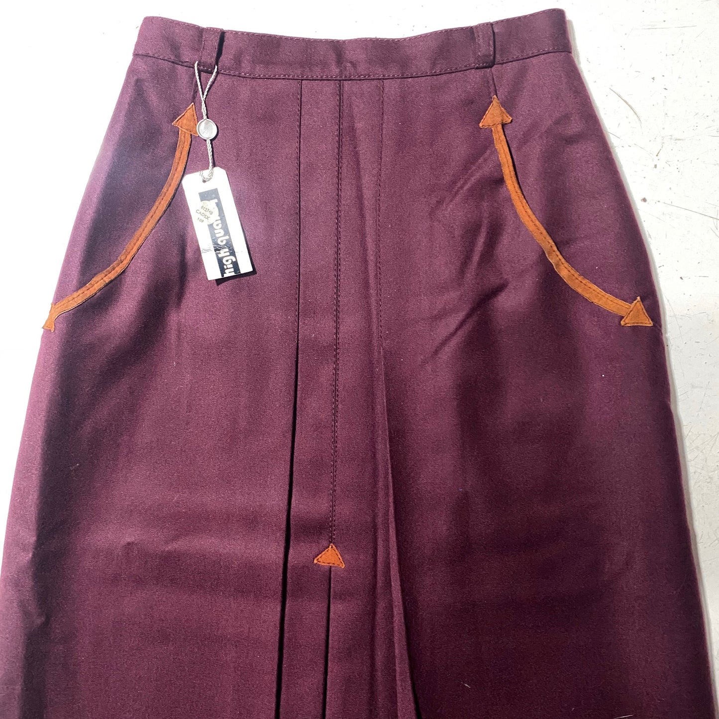 1970s NOS burgundy pure new wool skirt with brown suede details, made in Italy new with tags.