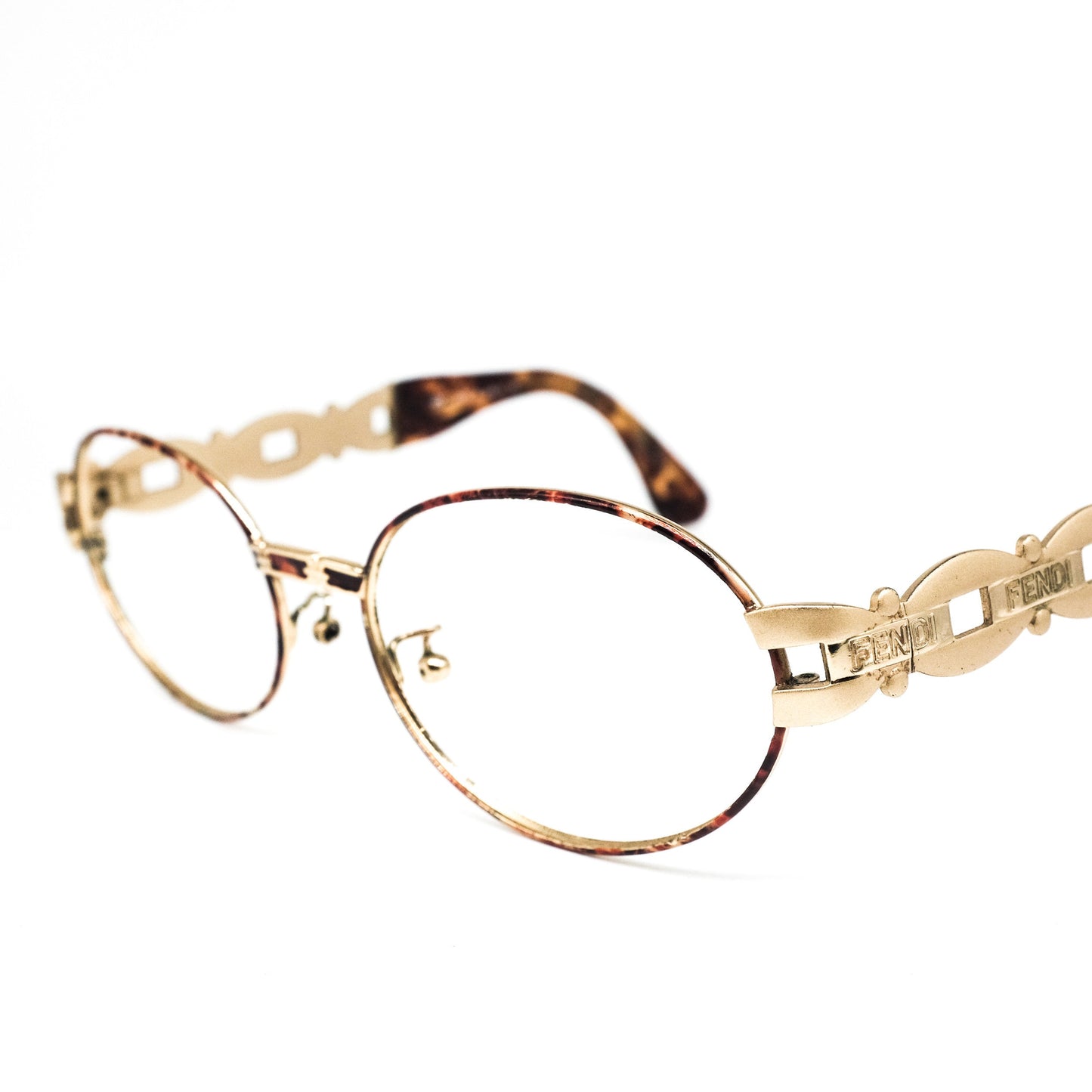 Fendi SL 7058 oval satin gold eyeglasses frames with cutoff logo details on temples, 90s great condition