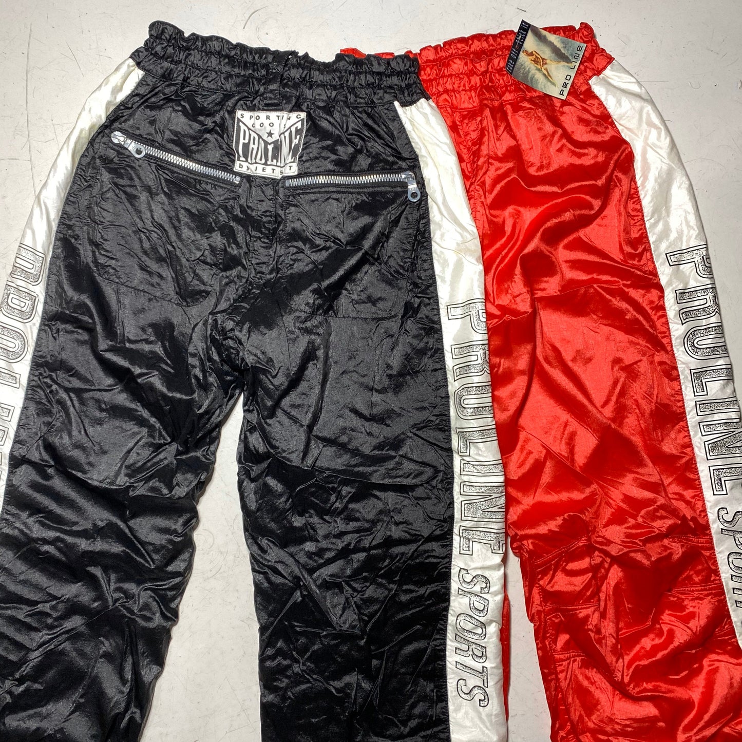 Proline by Jet Set cool boxer style sky / snow padded nylon trousers, new with tags, coming in red or black