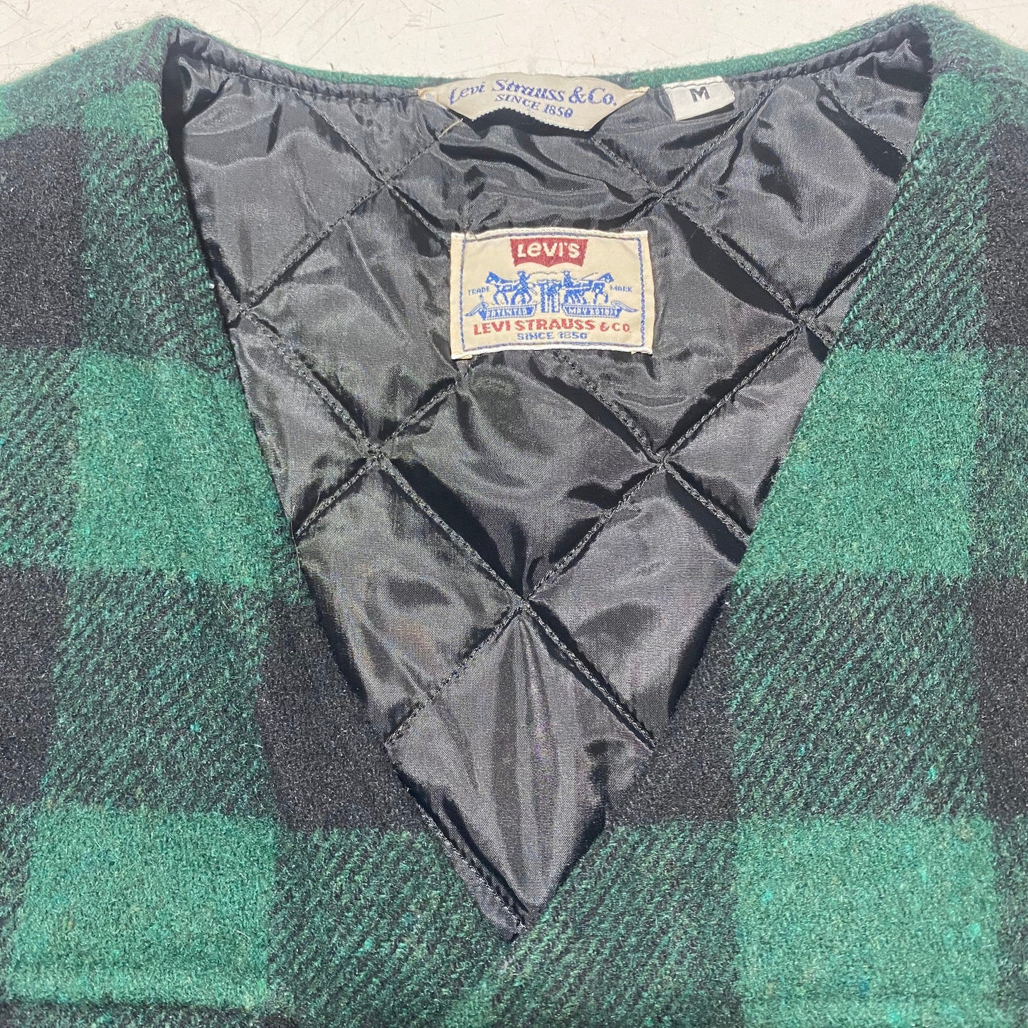 Levi’s western style green / black checkered wool vest with leather buttons in Great condition