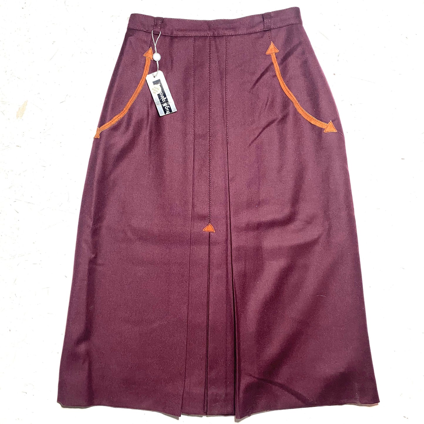 1970s NOS burgundy pure new wool skirt with brown suede details, made in Italy new with tags.