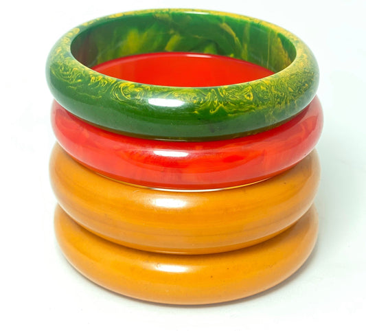 1950s ca plain Bakelite bangle bracelets, coming in a variety of colors in mint condition.