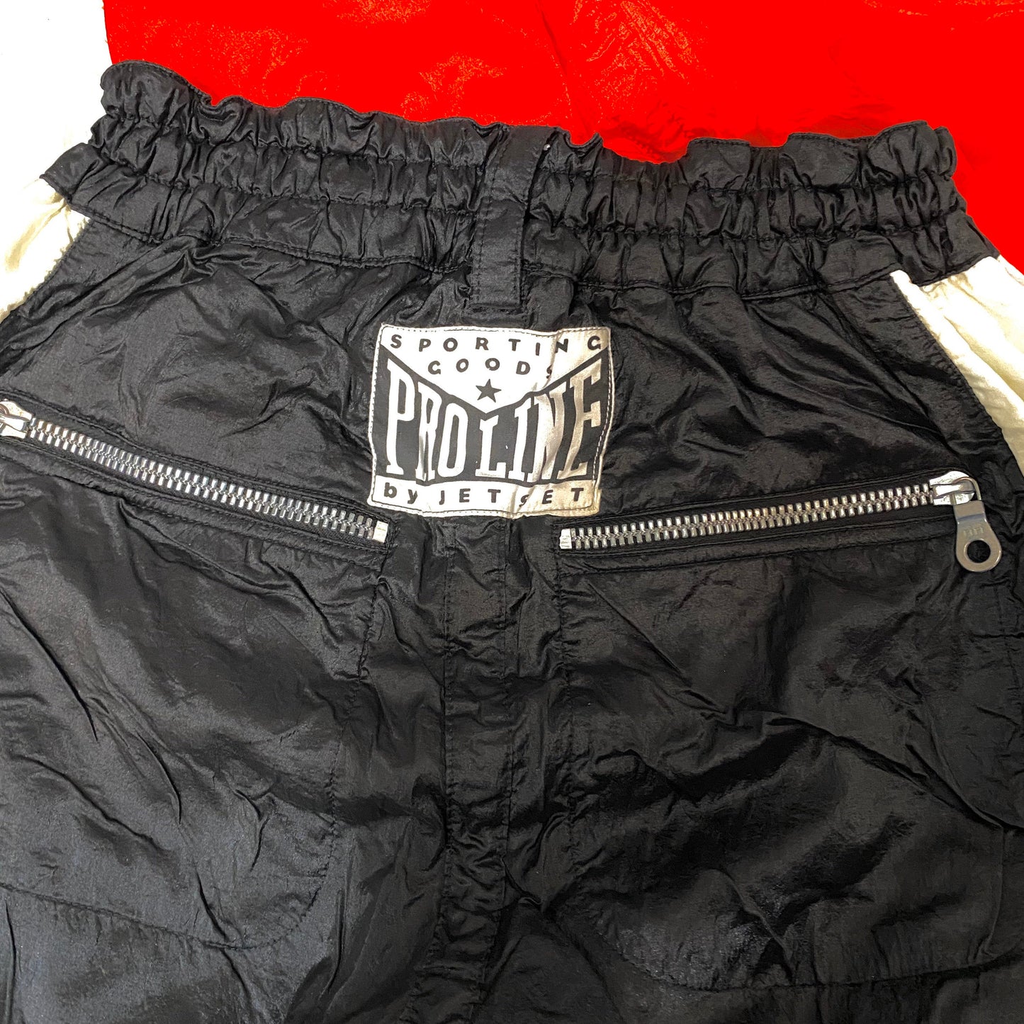 Proline by Jet Set cool boxer style sky / snow padded nylon trousers, new with tags, coming in red or black