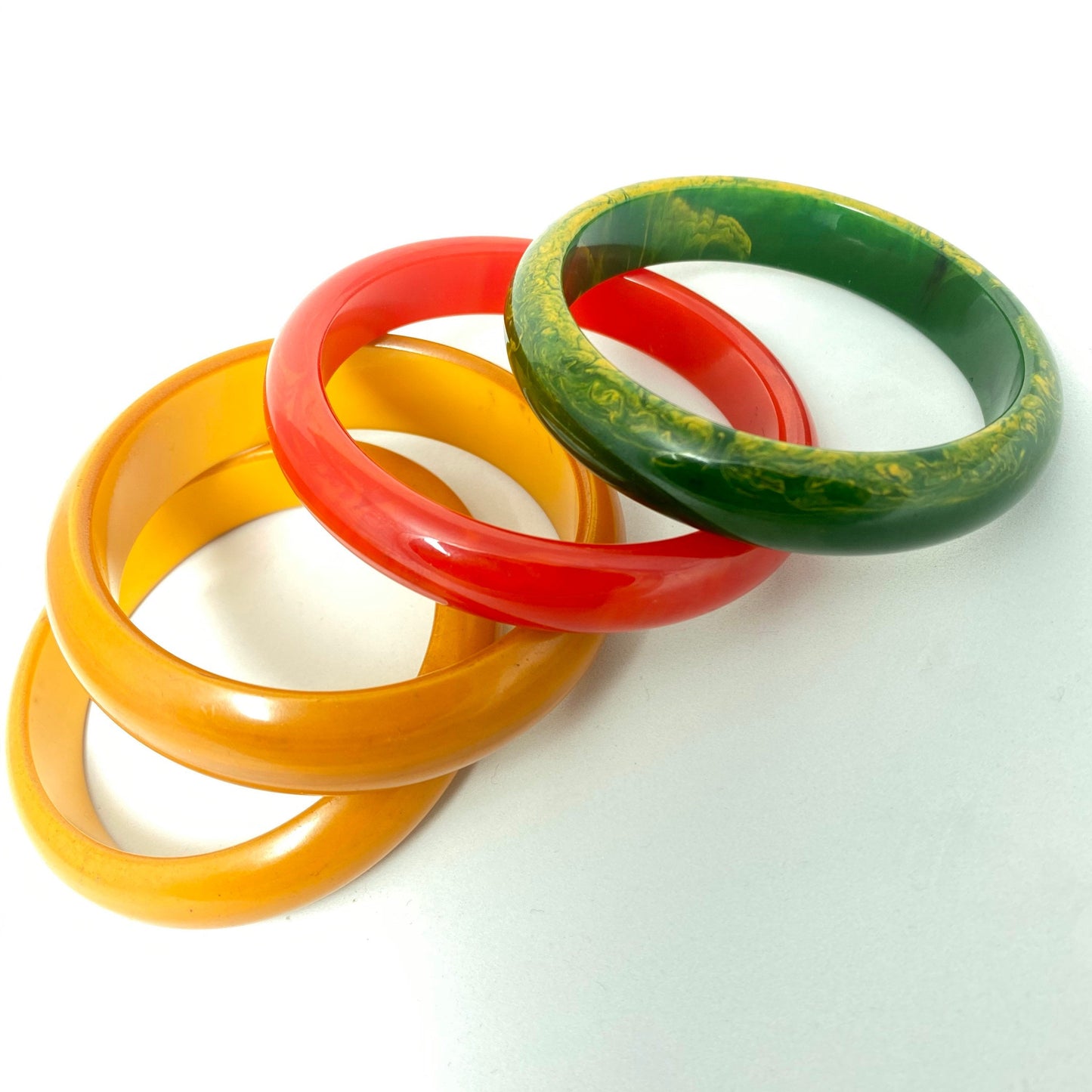 1950s ca plain Bakelite bangle bracelets, coming in a variety of colors in mint condition.