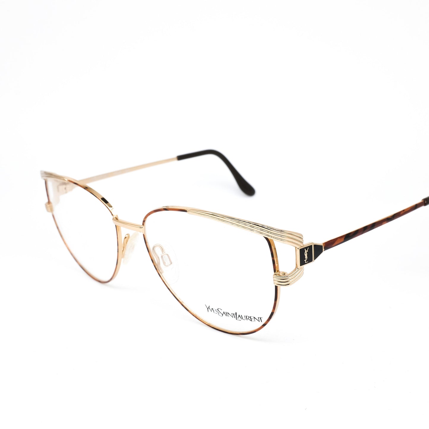 YSL Saint Laurent y106 golden metallic cateye eyeglasses frames with bold brown tortoise temples.