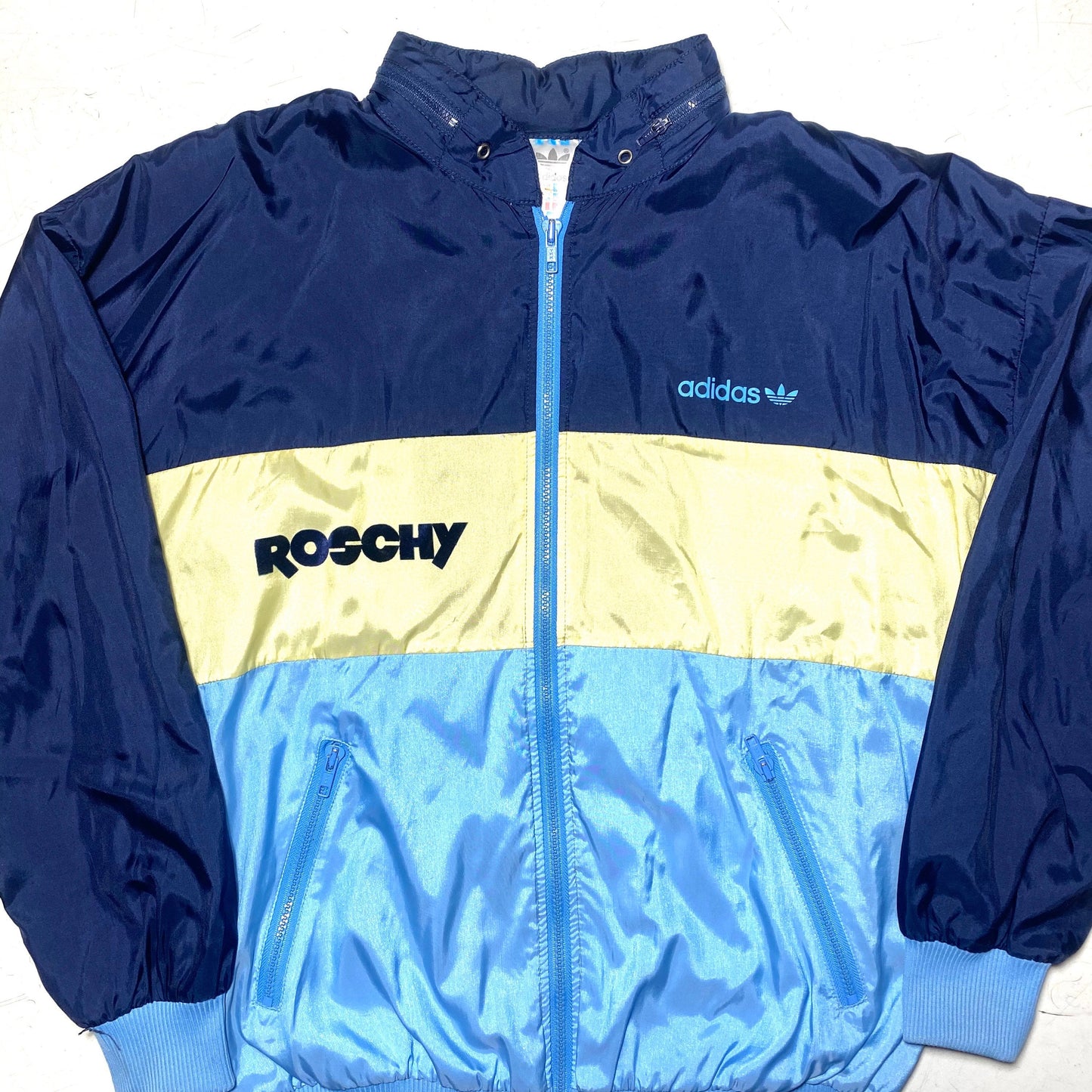 Adidas Roschy azure/ yellow/ navy satin windbreaker with retractable hood, 80s mint condition