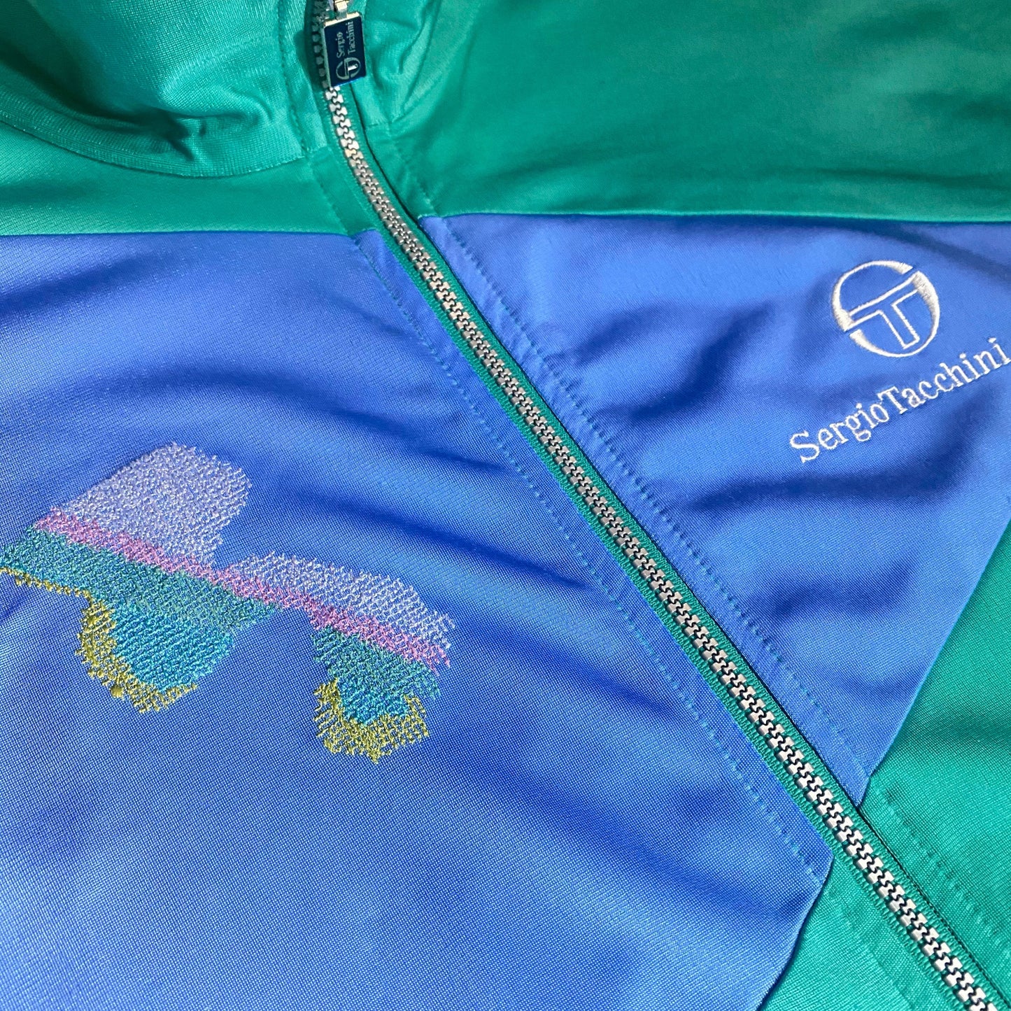 Sergio Tacchini 90s colorful patchwork tracktop jacket with embroidered details, Mint condition.