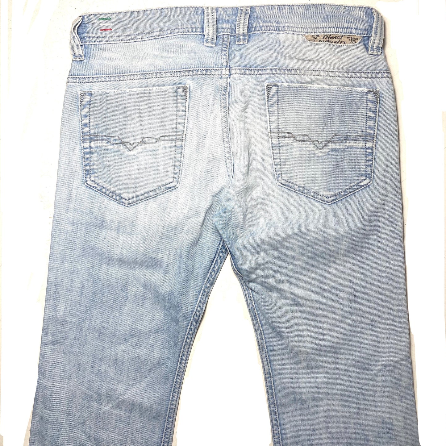 Diesel 90s distressed light blue jeans with back patches, finest quality made in Italy NOS