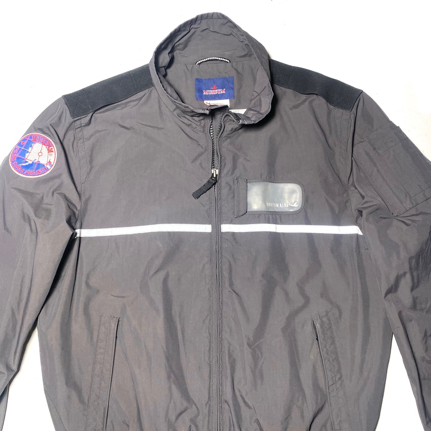 Museum Canadian guards technical nylon windbreaker jacket with reflective inserts, 90s mint condition