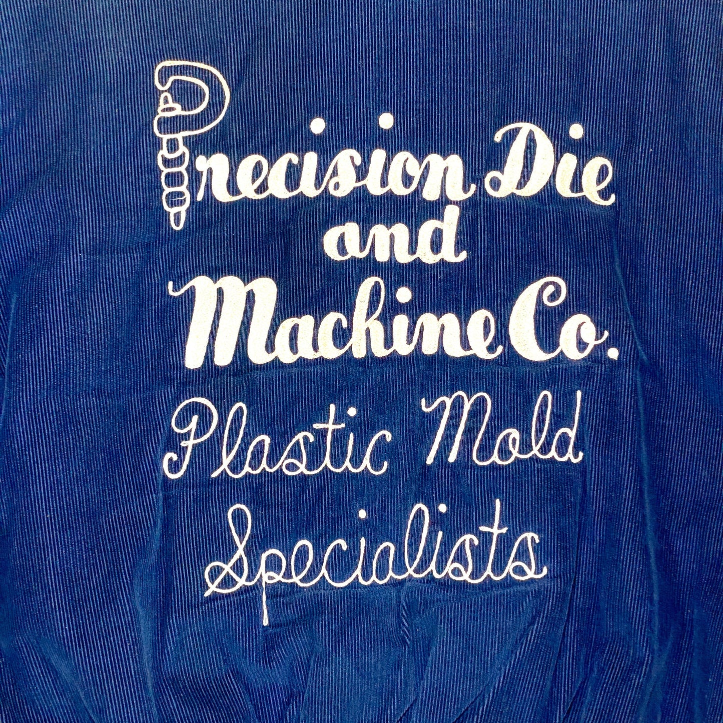 One of a kind embroidered navy corduroy varsity for “SAC precision die and machine co. Plastic mold specialists” in mint condition