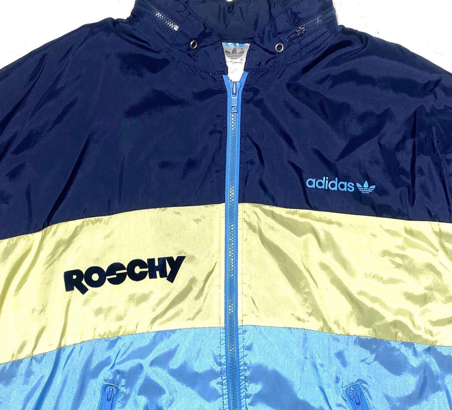 Adidas Roschy azure/ yellow/ navy satin windbreaker with retractable hood, 80s mint condition