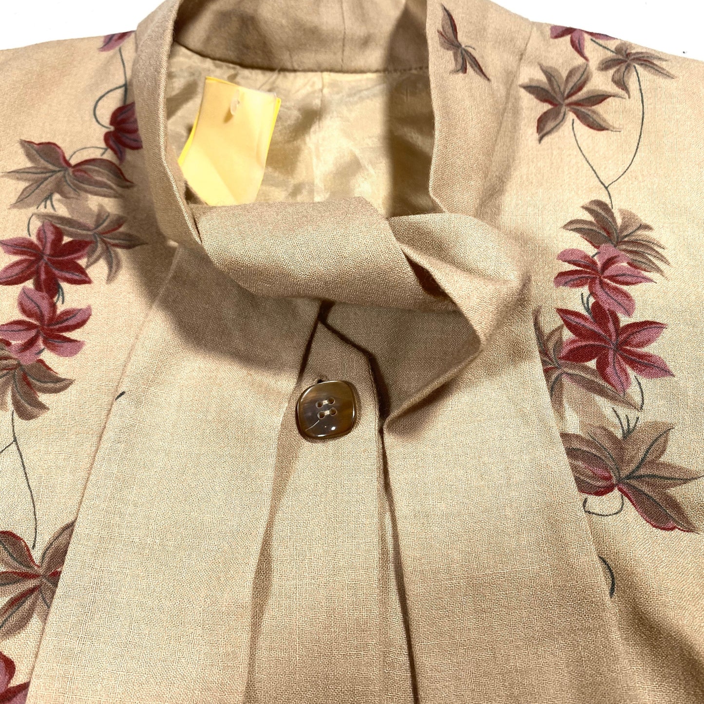 1960s beige light wool blouse with silk lining, floral motif and bow/tie collar, sz M mint