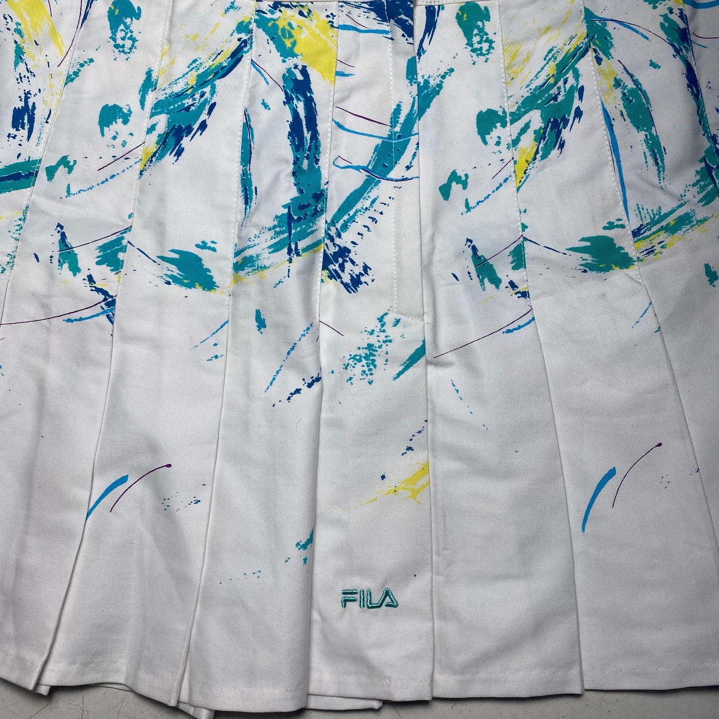 Fila vintage 90s white cotton pleated tennis/ skater skirt with abstract print, new with tags