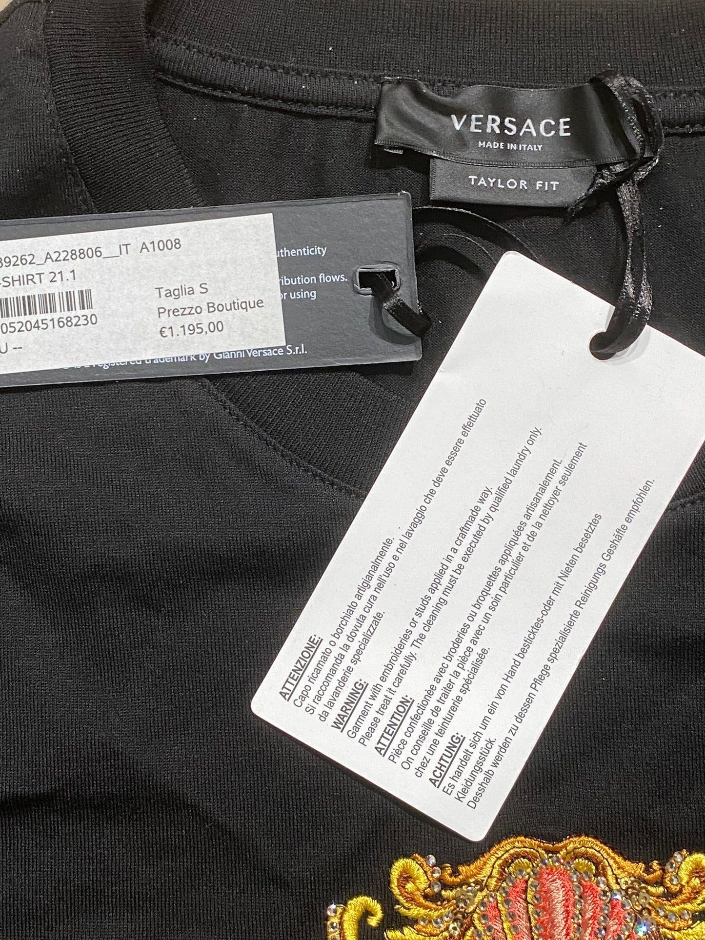 Versace t shirt clearance tag