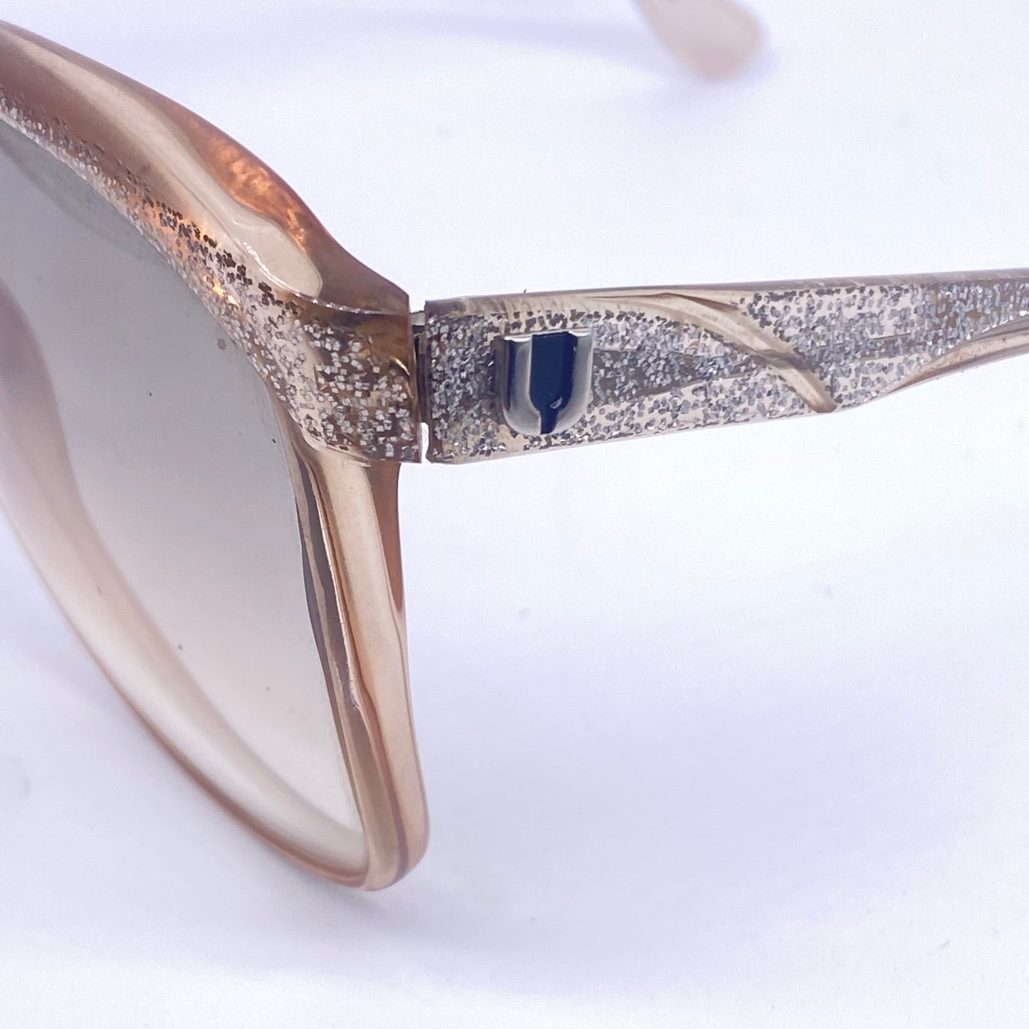 Ungaro oversized sunglasses, catchy silver glitter details over translucent sand color base, 80s Italy NOS