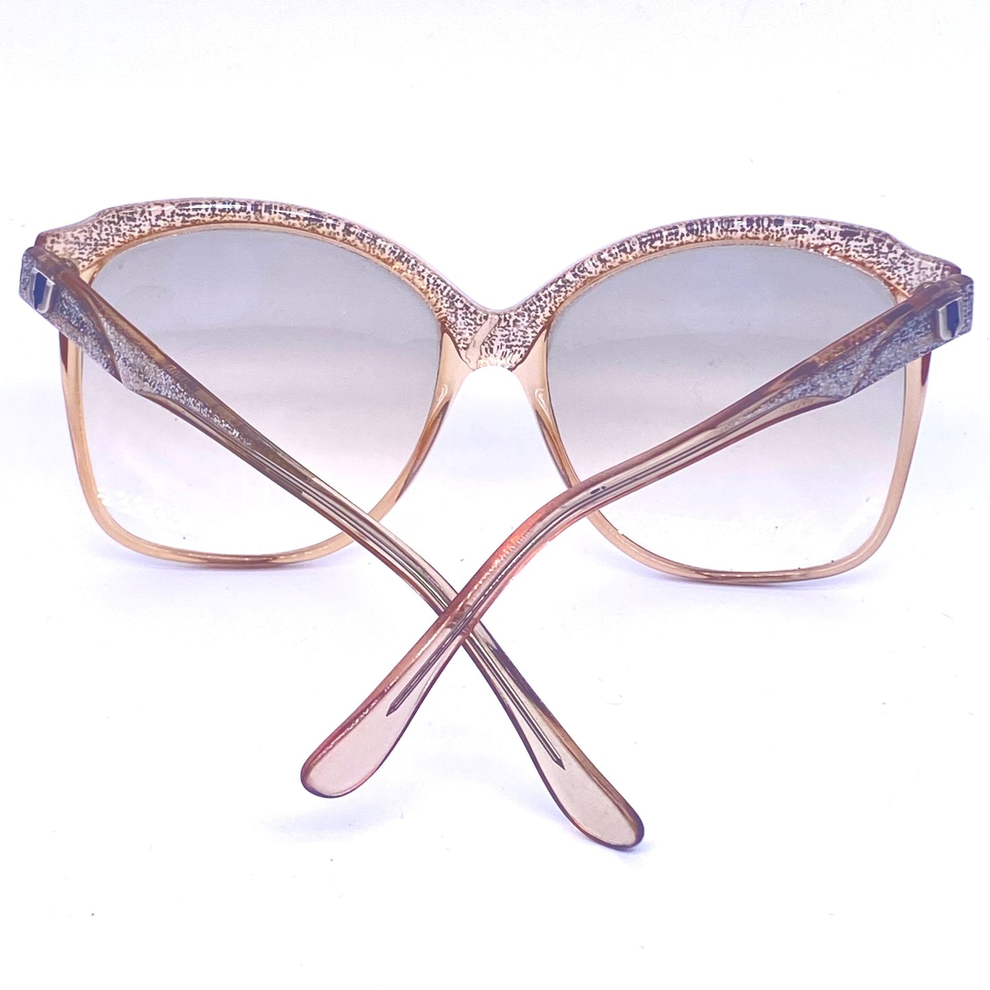 Ungaro oversized sunglasses, catchy silver glitter details over translucent sand color base, 80s Italy NOS