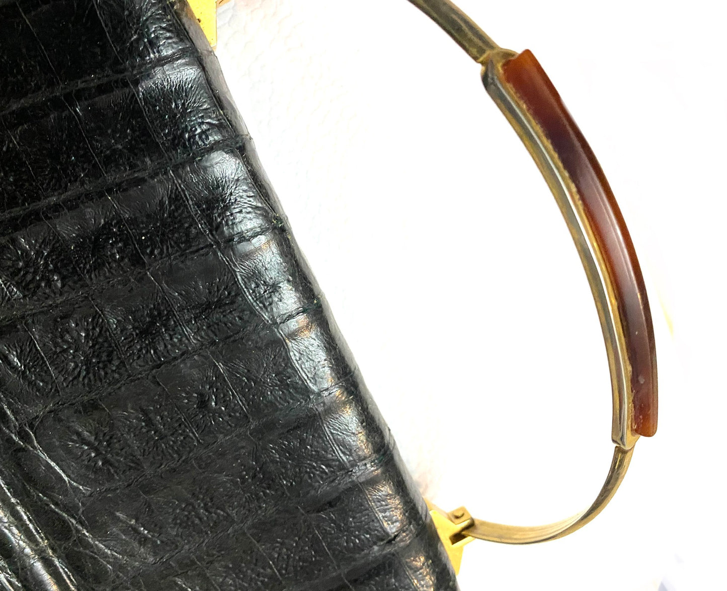 1970s black alligator clutch bag with brass / tortoise Bakelite handle, mint