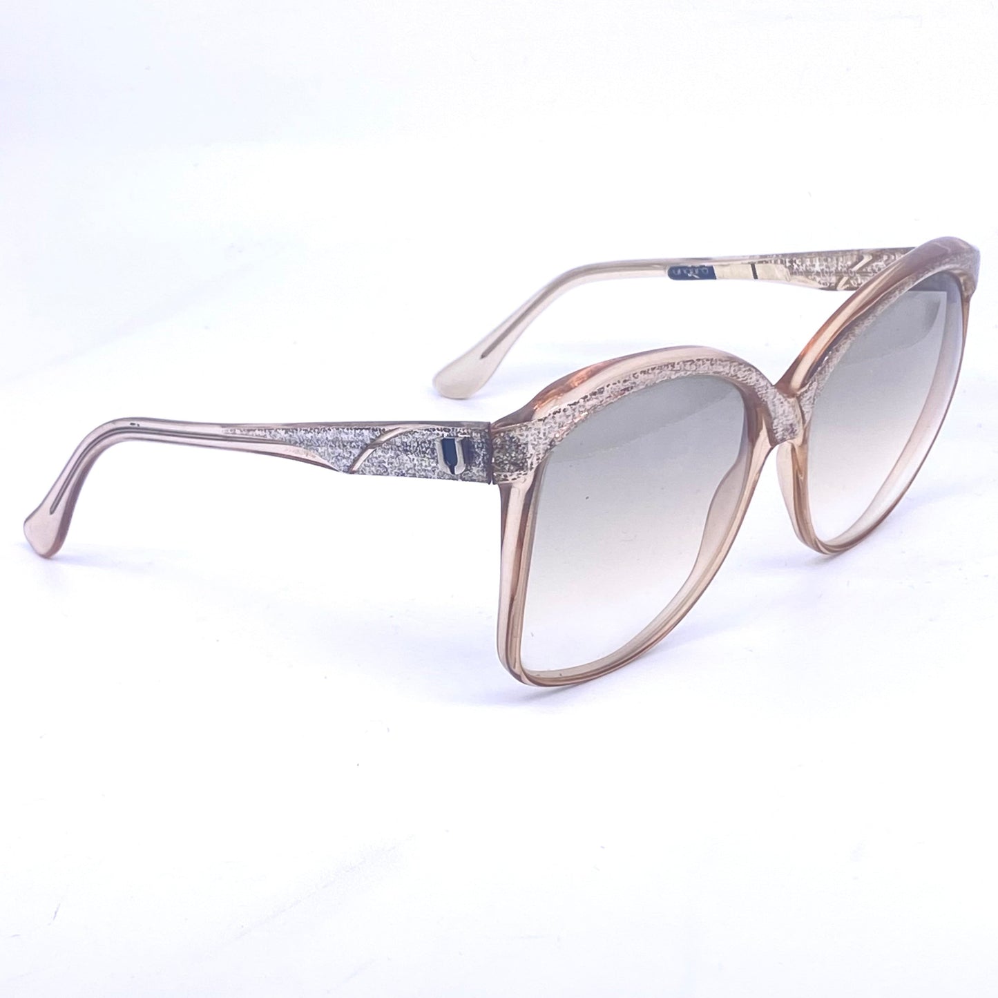 Ungaro oversized sunglasses, catchy silver glitter details over translucent sand color base, 80s Italy NOS